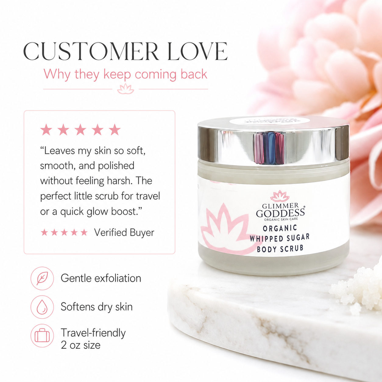 Glimmer Goddess Organic Whipped Sugar Body Scrub in a clear jar with a silver lid, displayed on a white marble slab with pink flowers in the background. The image includes promotional text highlighting customer love, a customer review, and product benefits.