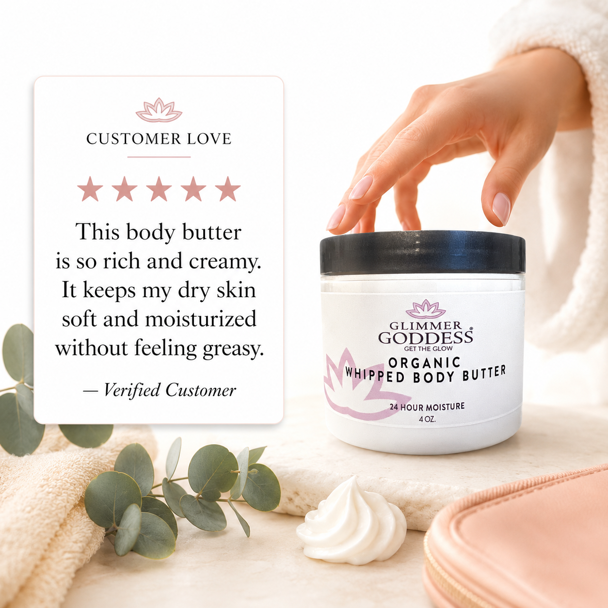 Glimmer Goddess Organic Whipped Body Butter with a hand holding it, surrounded by eucalyptus leaves and a towel.