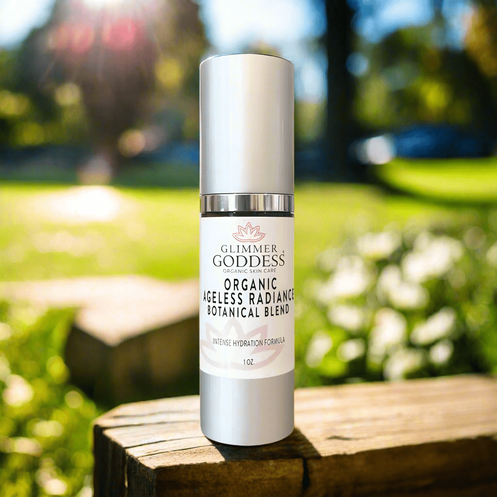 Organic Skin Brightening Serum from Glimmer Goddess outside on park bench