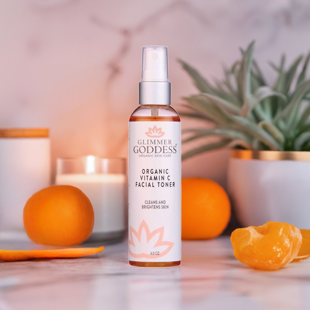 Organic Vitamin C Facial Toner from Glimmer Goddess bottle by oranges