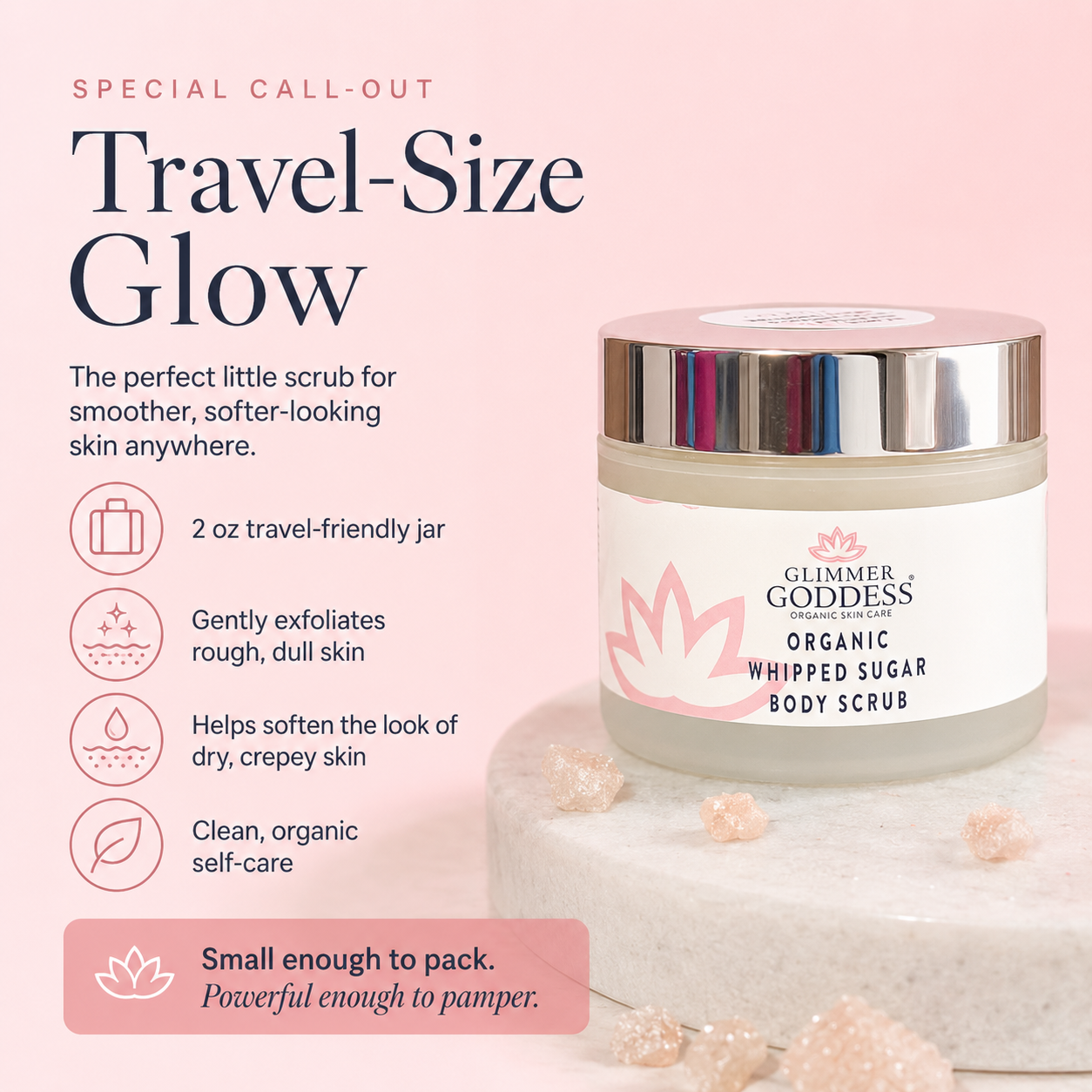 Glimmer Goddess Organic Whipped Sugar Body Scrub in a travel-size jar, displayed on a marble pedestal with pink sugar crystals. The left side features promotional text highlighting the 2 oz travel-friendly jar and its benefits.