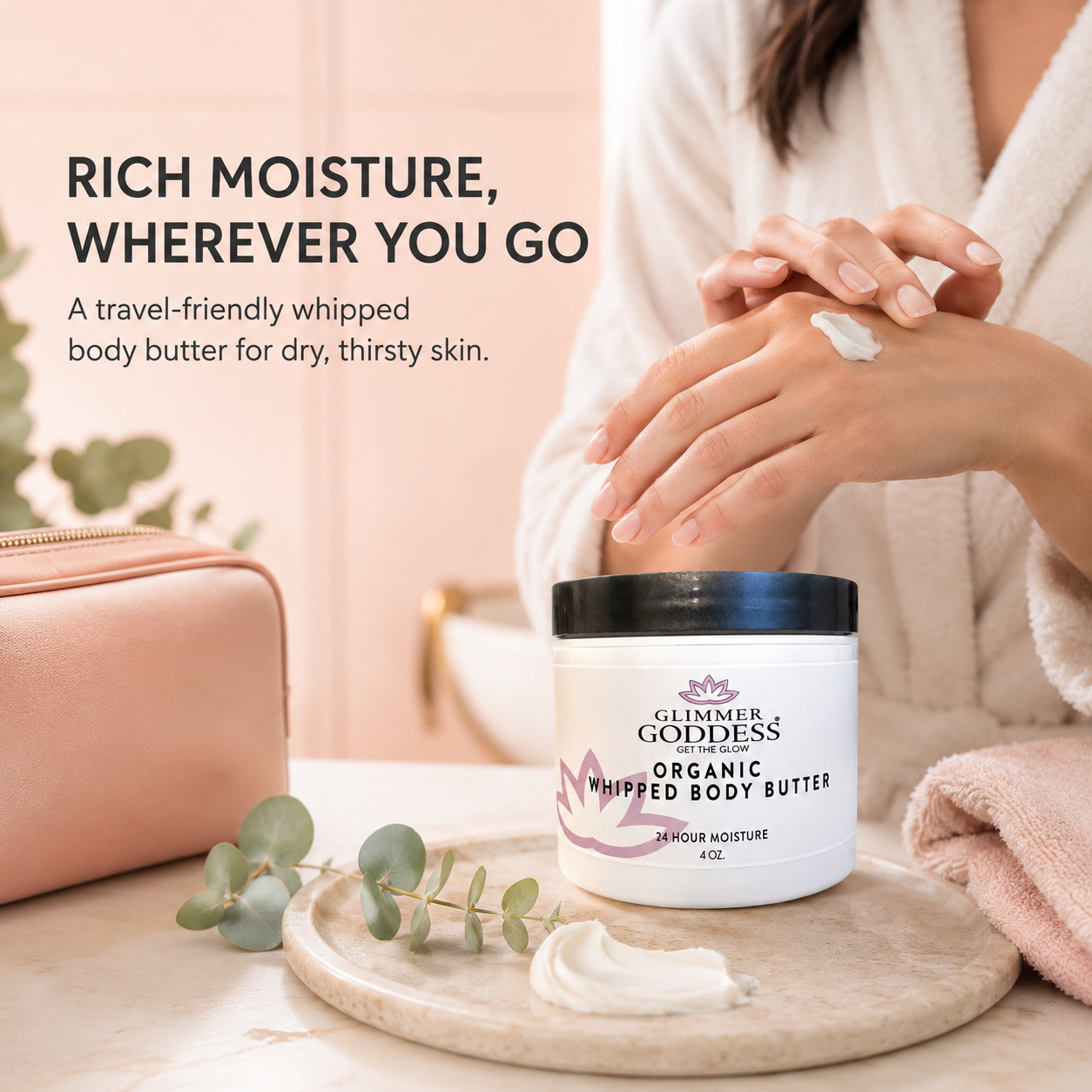 Glimmer Goddess organic whipped body butter with a person applying it on their arm, set against a soft pink background.
