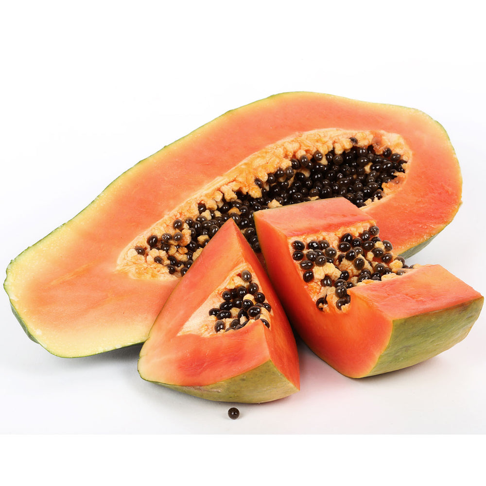 Fresh papaya fruit slices with seeds on white background, organic skincare ingredient