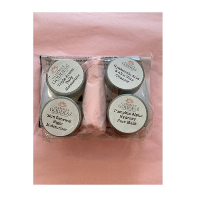 Glimmer Goddess Organic Skin Care Anti-Aging Trial Set with five best sellers and a bonus mask, featuring natural skincare products.