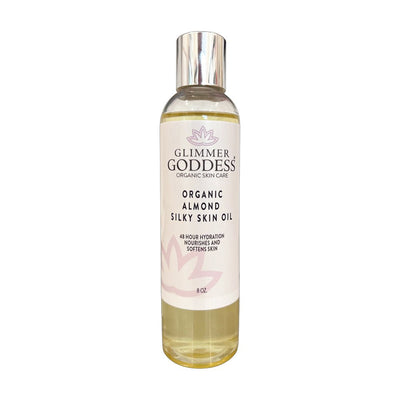 Organic Sweet Almond Silky Skin Oil by Glimmer Goddess Organic Skin Care, a moisturizing lotion with a silky texture and 48-hour hydration.